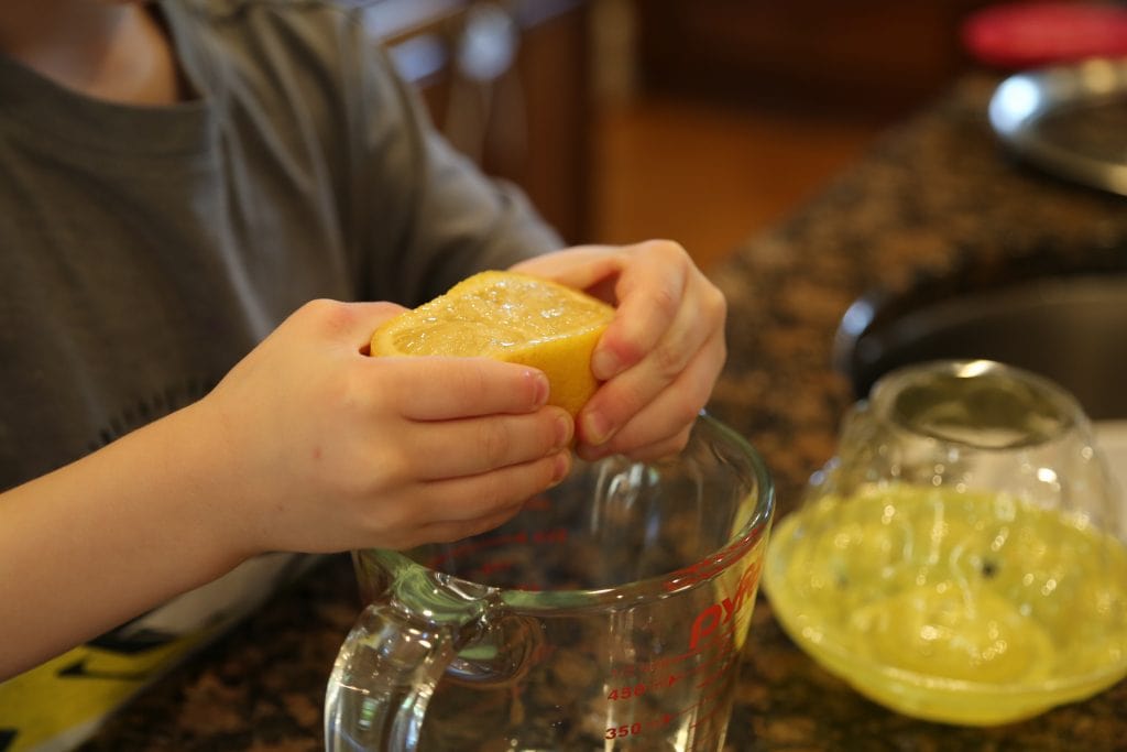 Child juicing lemon
