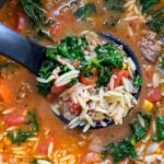 closeup soup with orzo veggies and Italian sausage