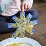 Acini de Pepe Snowflake in child's hand