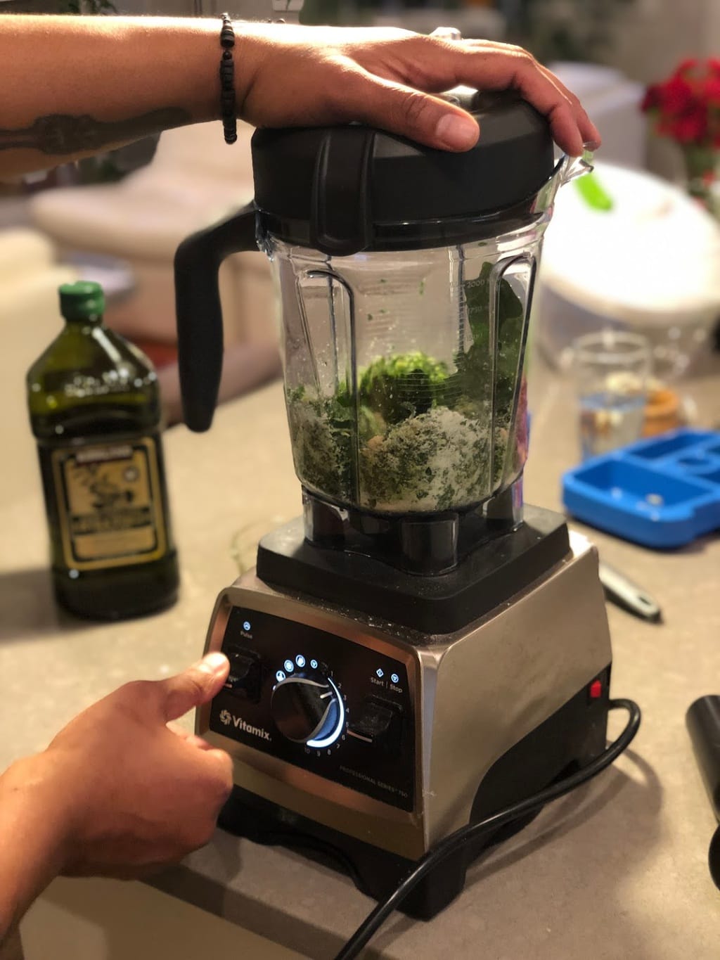 blending pesto ingredients in blender