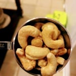 cashews in measuring cup