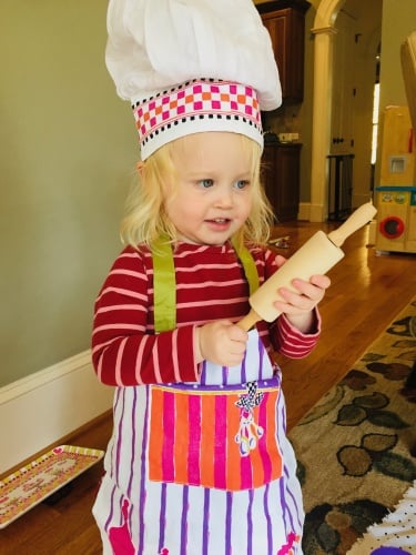 child dressed as chef