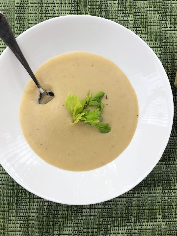 Potato Leek Soup with spoon and bread