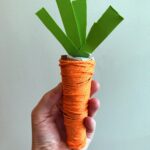 hand holding carrot craft