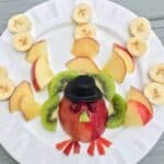 turkey on a plate made with fruit slices and scraps