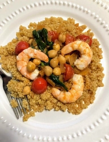 Garlic Shrimp with Chickpeas over Quinoa on plate