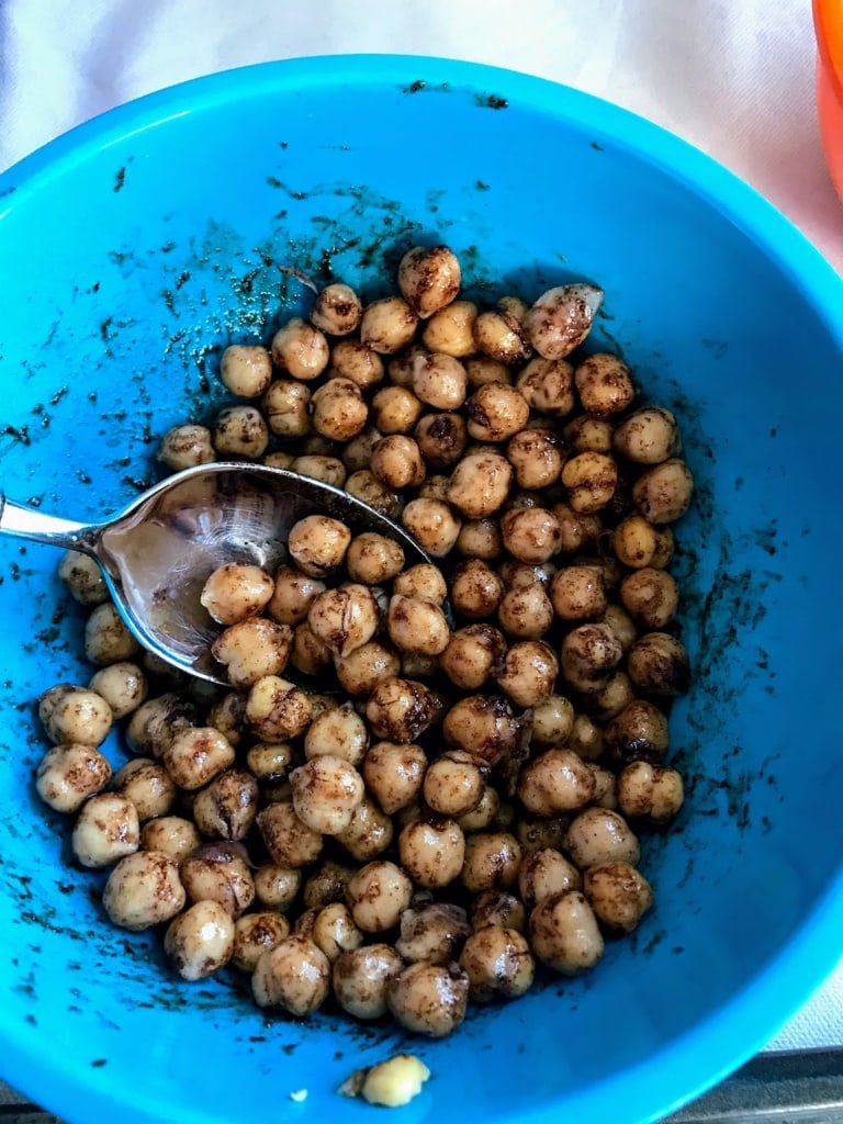 mixing chickpeas in bowl