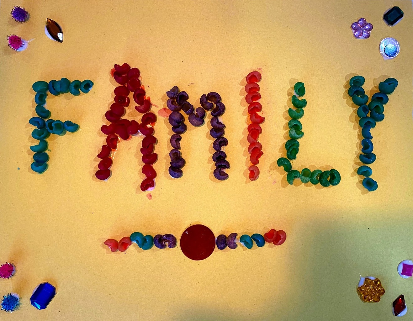 picture of word family made with colored shell pasta