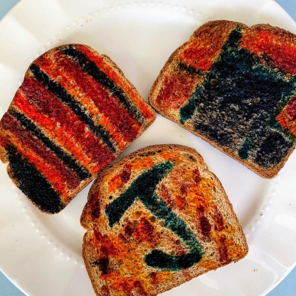 three pieces of painted toast