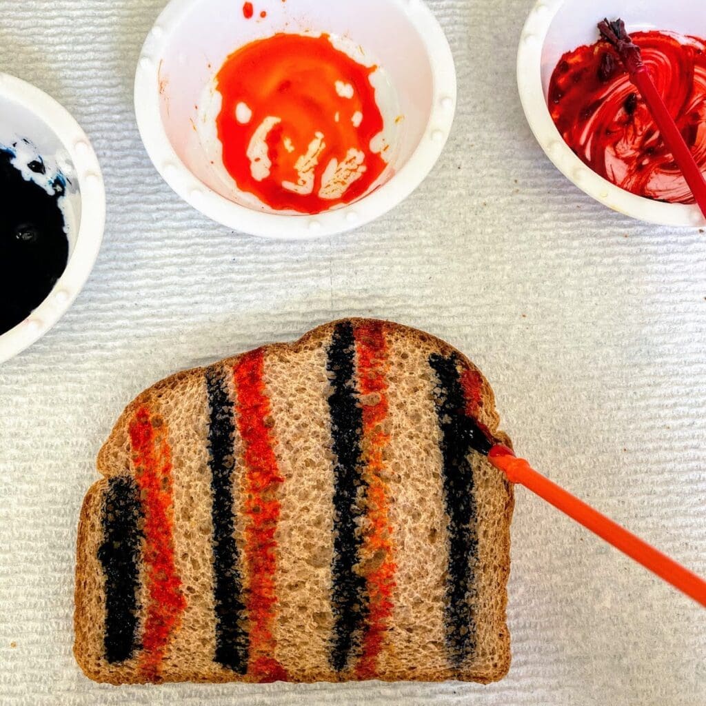 painting toast with paint brush