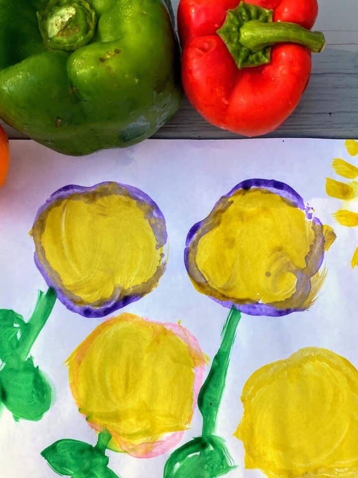 four bell pepper art stamps on white paper