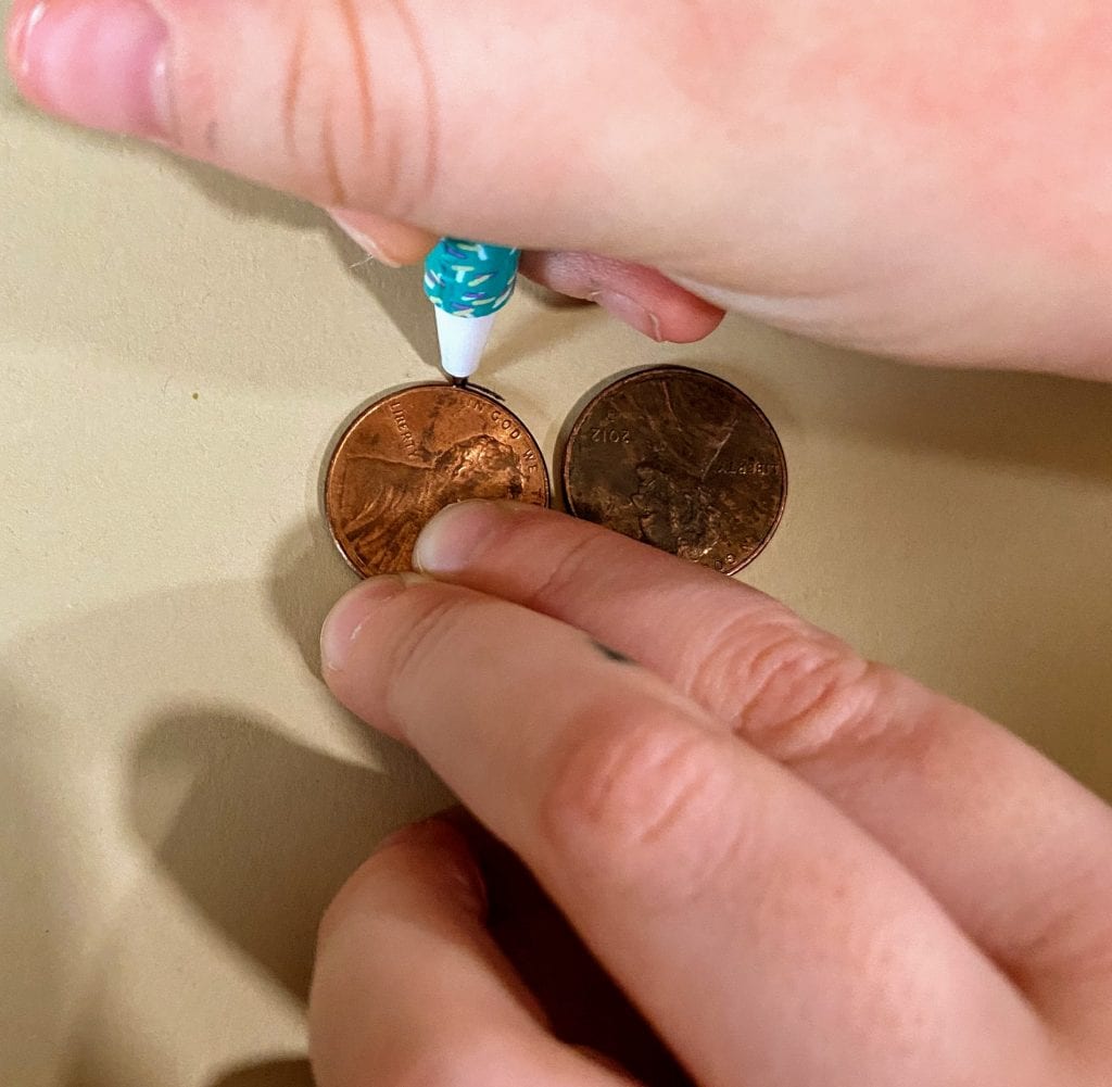 Tracing pennies for eyes for owl DIY napkin ring