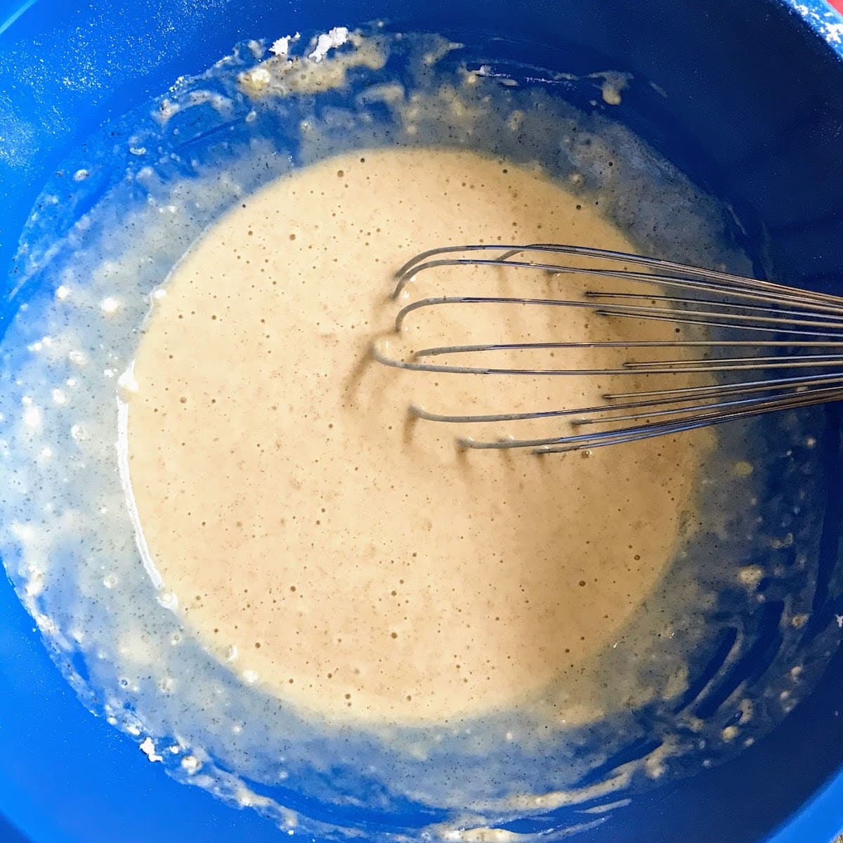 mixing pancake batter with whisk