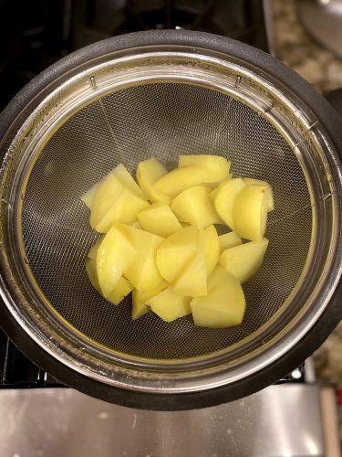 steamed potatoes in basket
