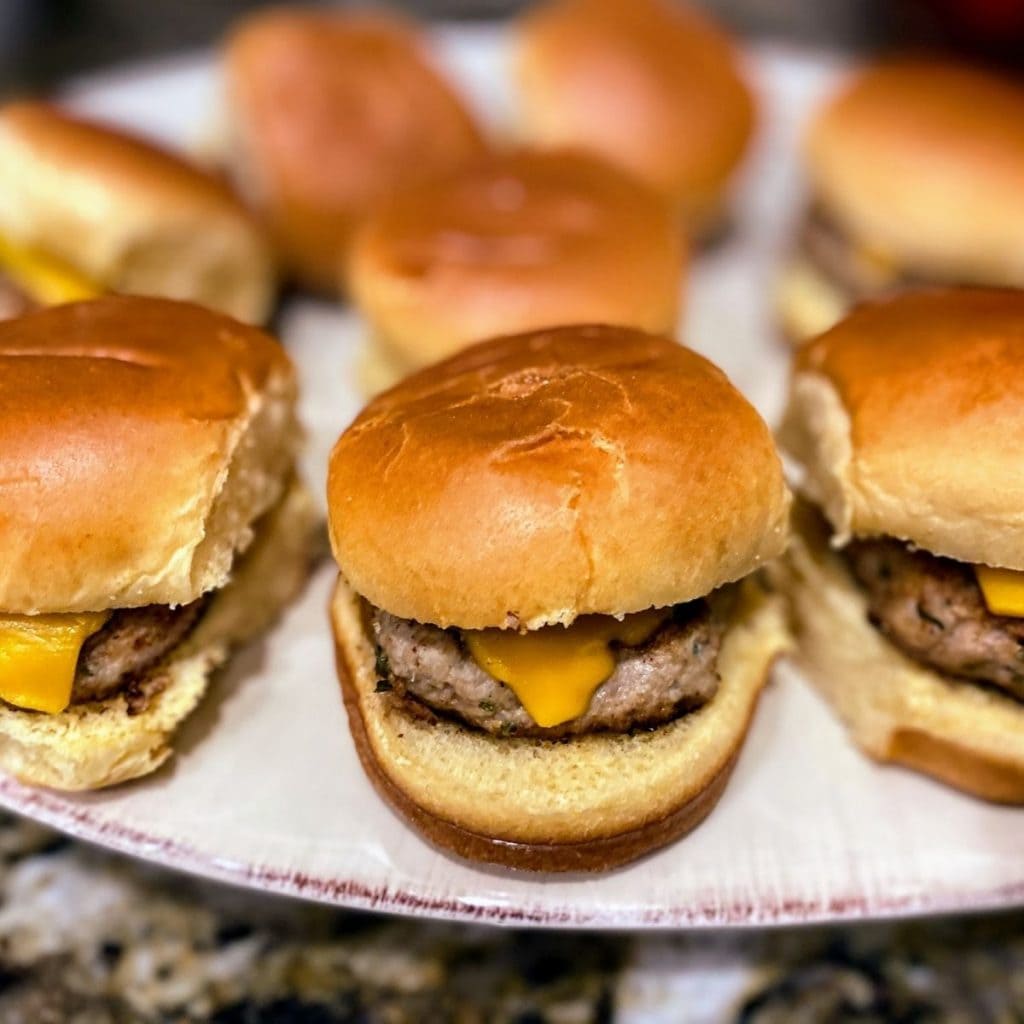 turkey burger sliders spread out on large plate