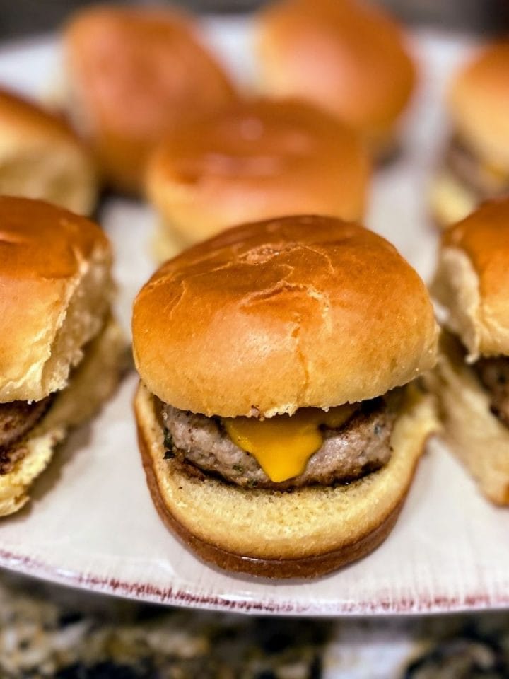 turkey burger sliders spread out on large plate