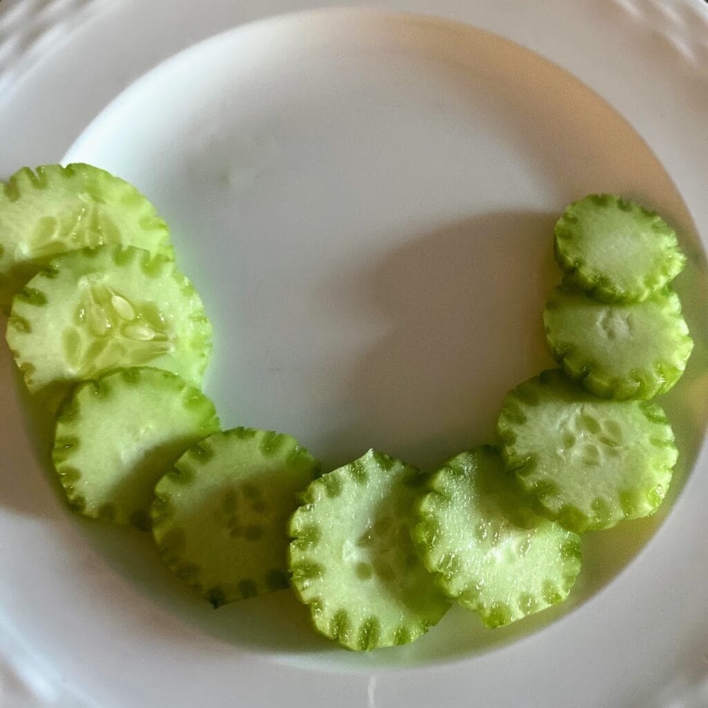 cucumbers in c shape on plate