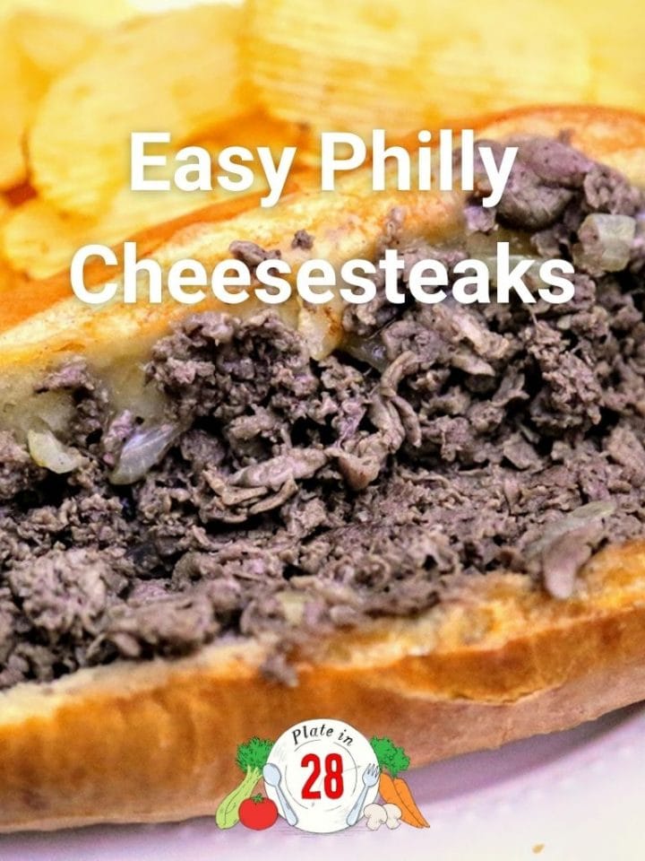 cheesesteak on long roll with potato chips