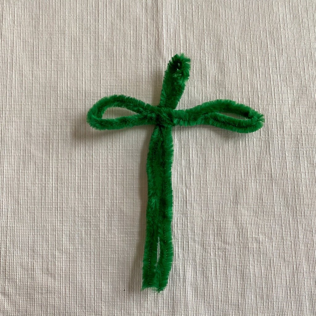 two green pipe cleaners together as a stem with leaves
