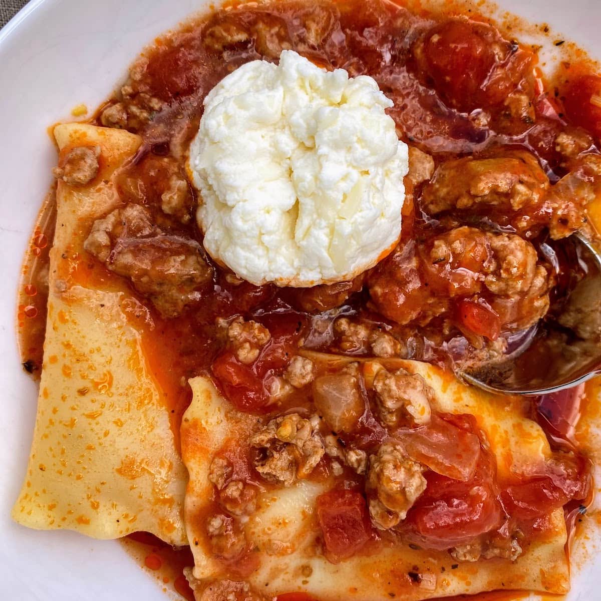 closeup of lasagna soup in bowl