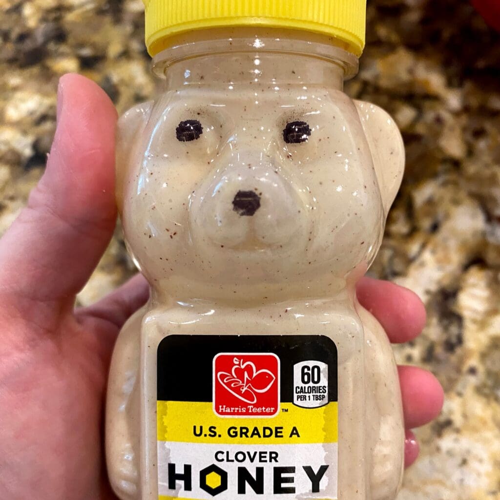 old honey squeeze jar filled with pancake batter