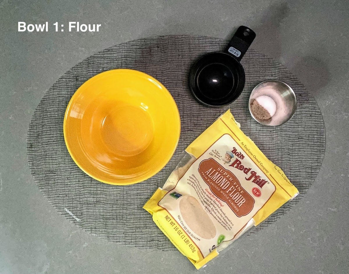 flour and seasoning next to yellow bowl 