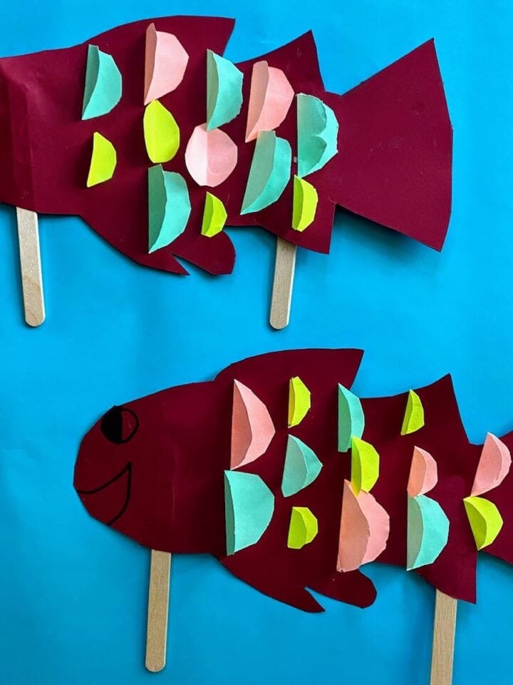 two red fish puppets