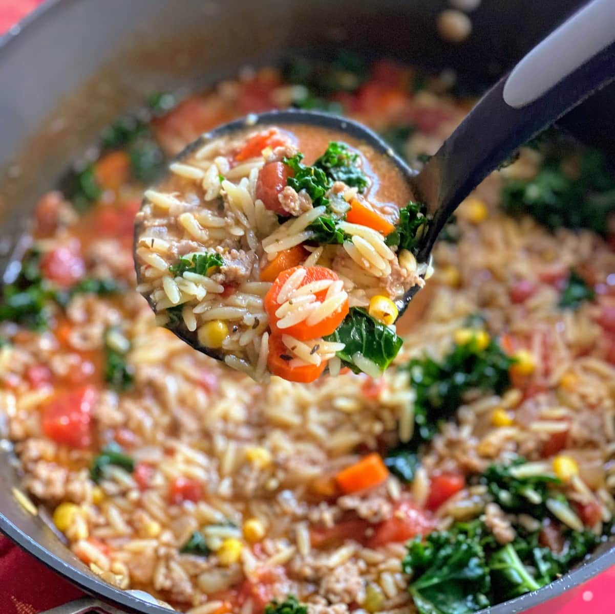 Closeup of Italian Sausage Soup with orzo