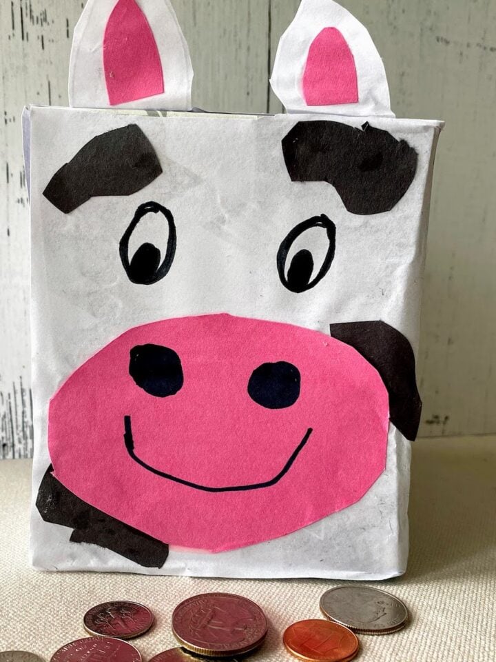 piggy bank with cow theme