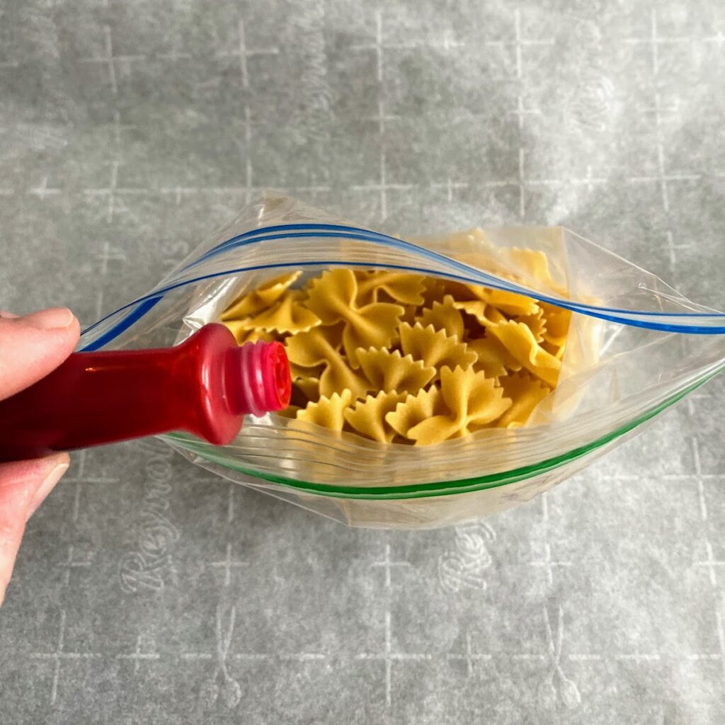add red food coloring to pasta bag