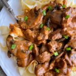 creamy beef and mushroom pasta in bowl