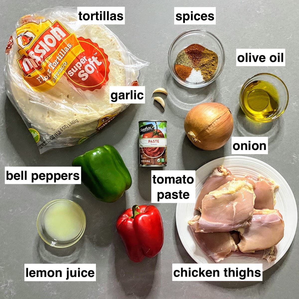 tortillas, chicken, spices and veggies to make fajita tacos