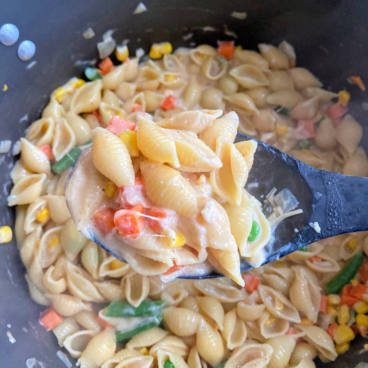 creamy vegetable pasta in pot