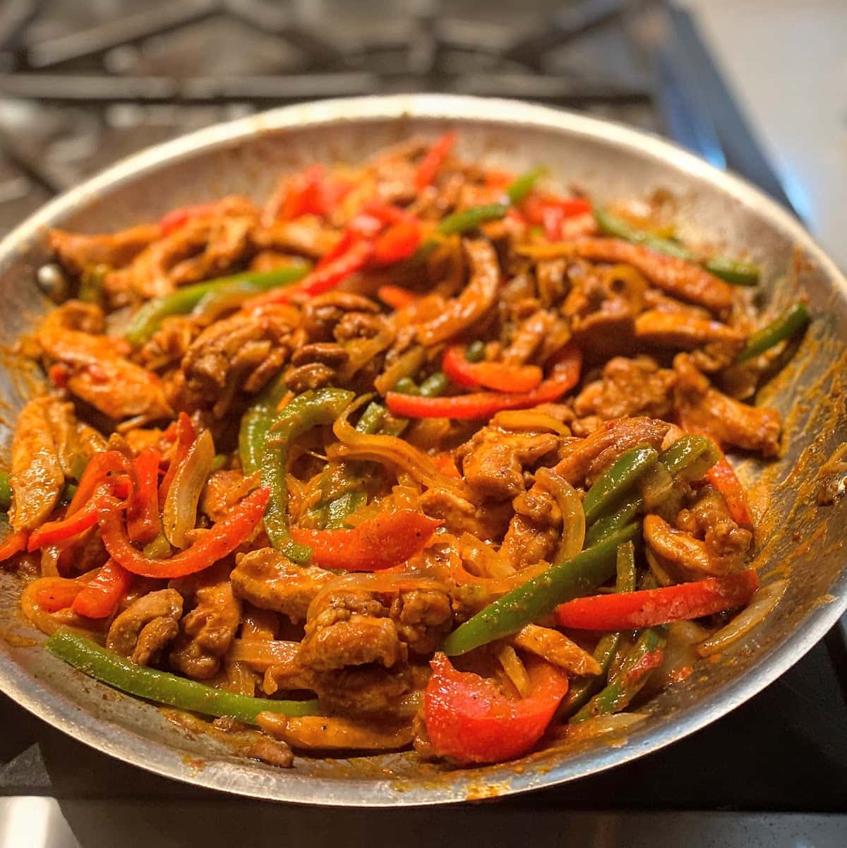 colorful chicken fajitas in pan