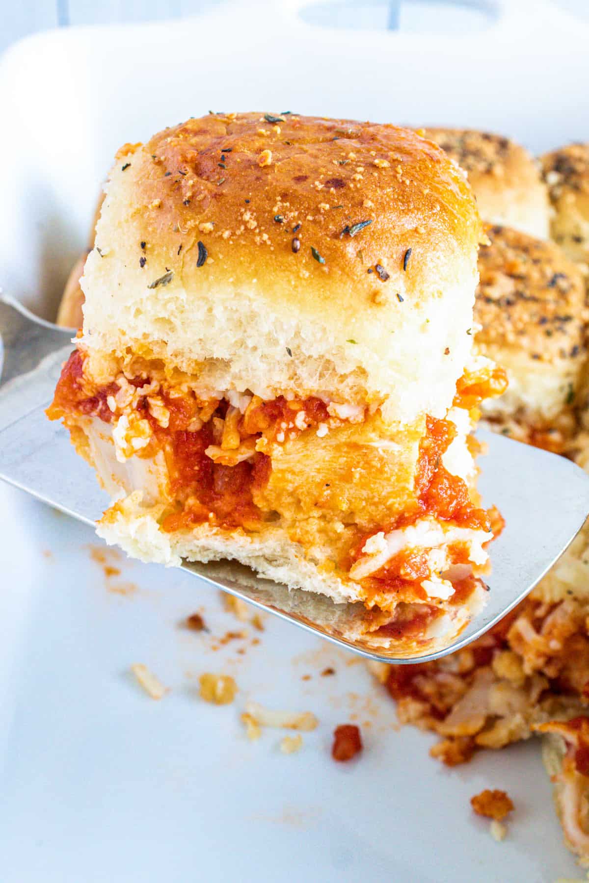 closeup of chicken parmesan slider 