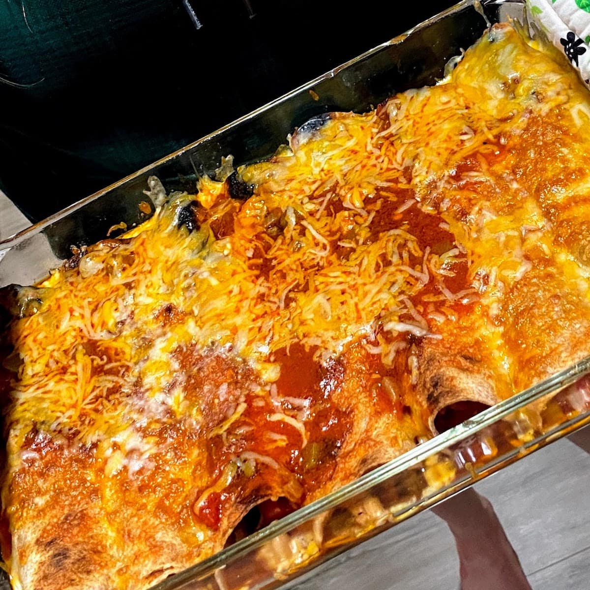 chicken enchiladas in baking pan 