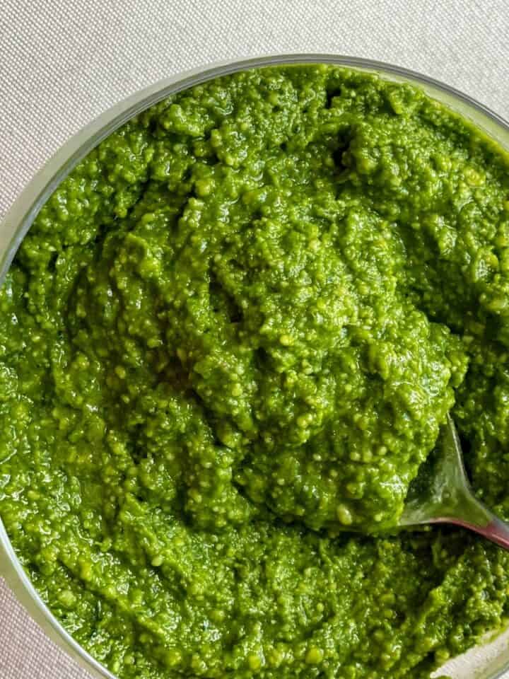 pesto in a dish with a spoon