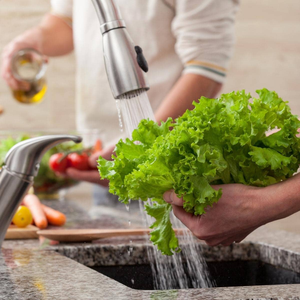 rinsing greens in sink