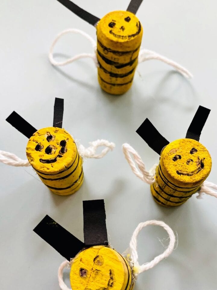 four honey bee cork crafts