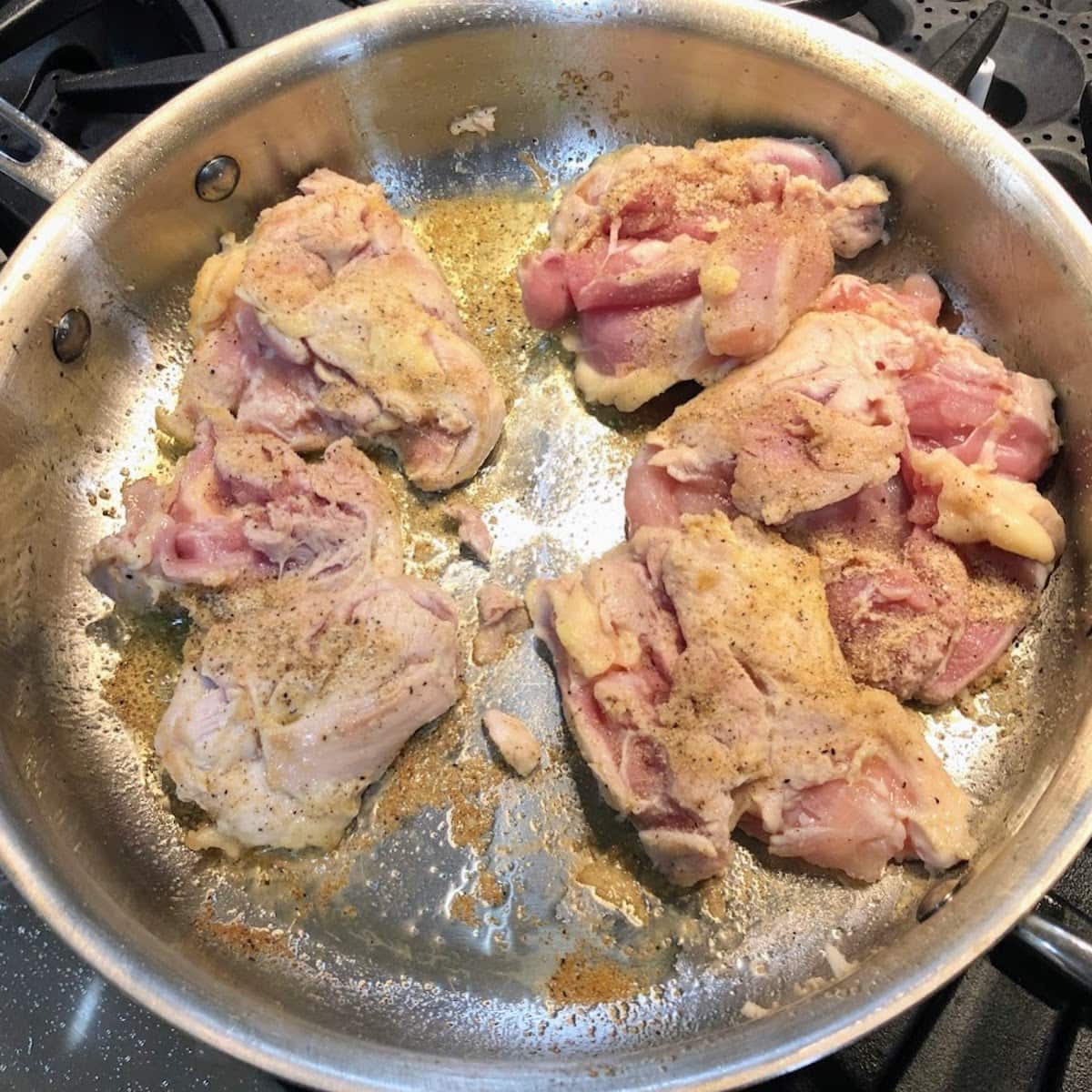 chicken seasoned in pan