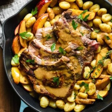 pork chops with gnocchi on plate