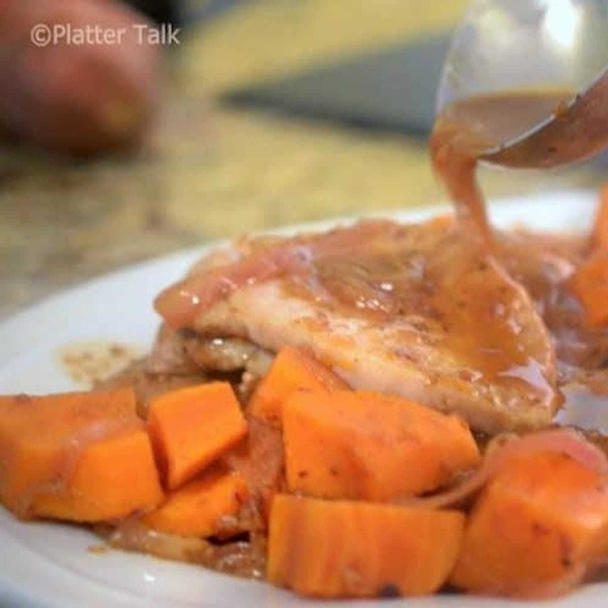 pork chops in sauce with sweet potatoes
