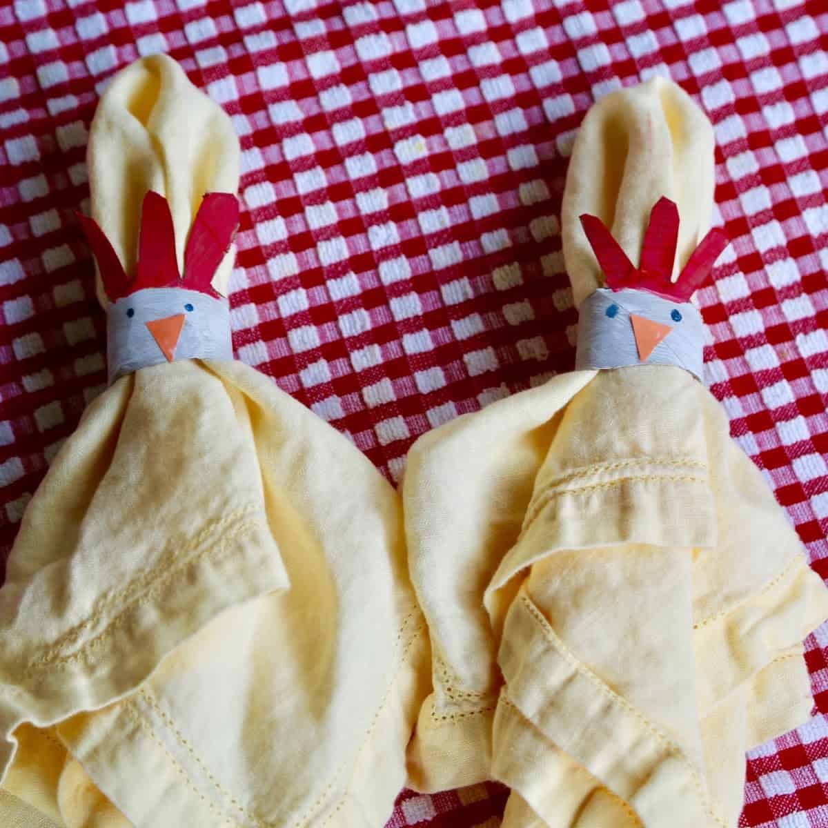 two chicken napkin holders