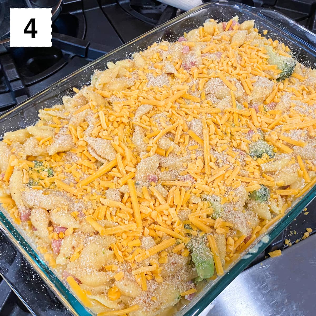 casserole dish with mac and cheese covered in breadcrumbs