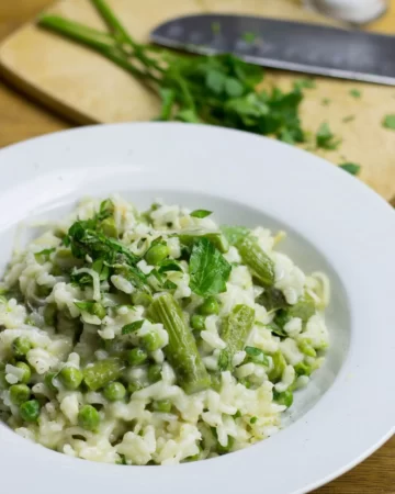 risotto and asparagus on plate