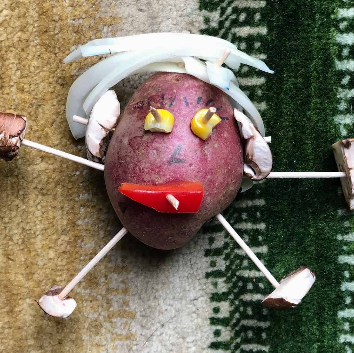 potato person made with veggies and toothpicks 