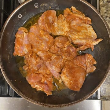 chicken marinating in pan 