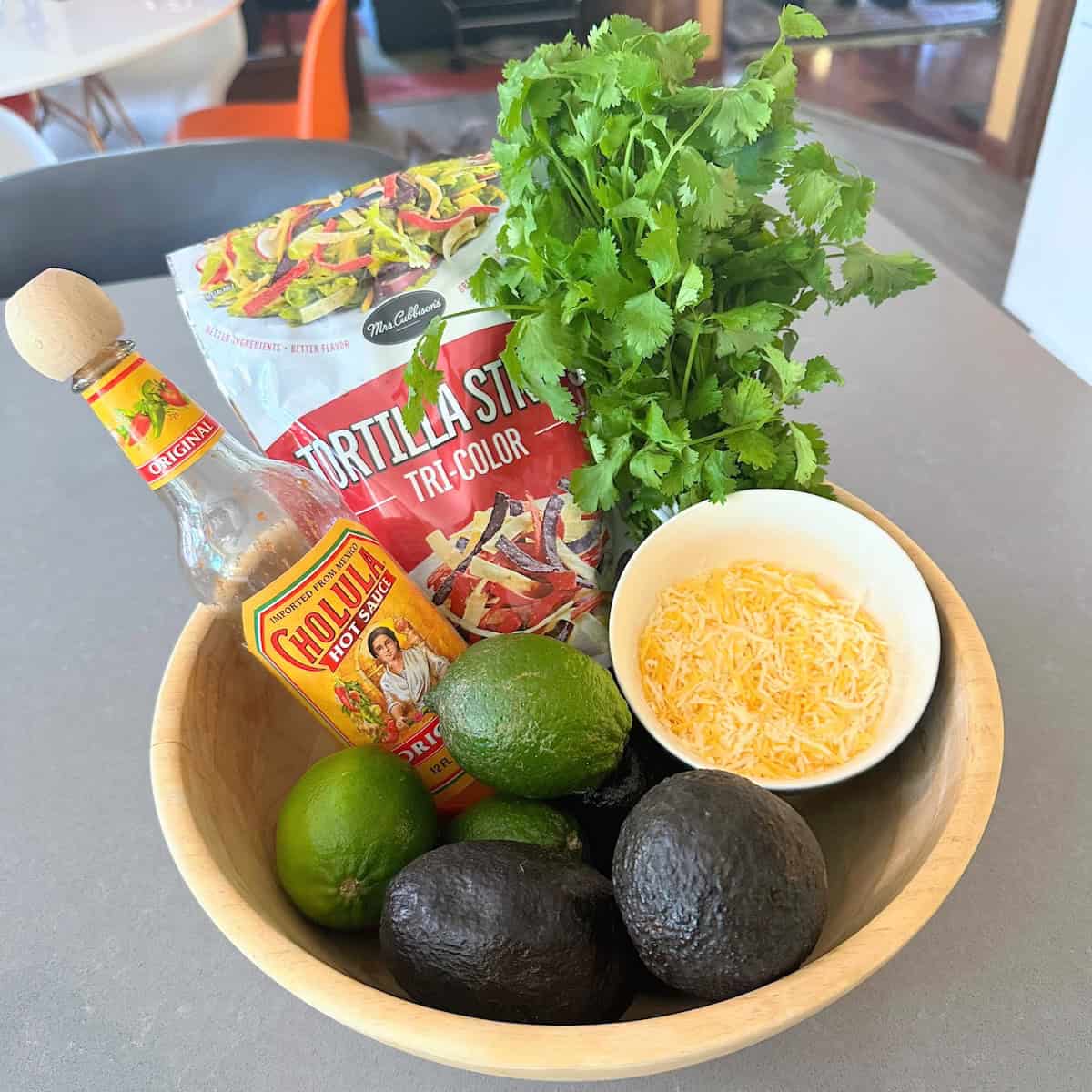 bowl of garnishes for a southwest chicken bowl