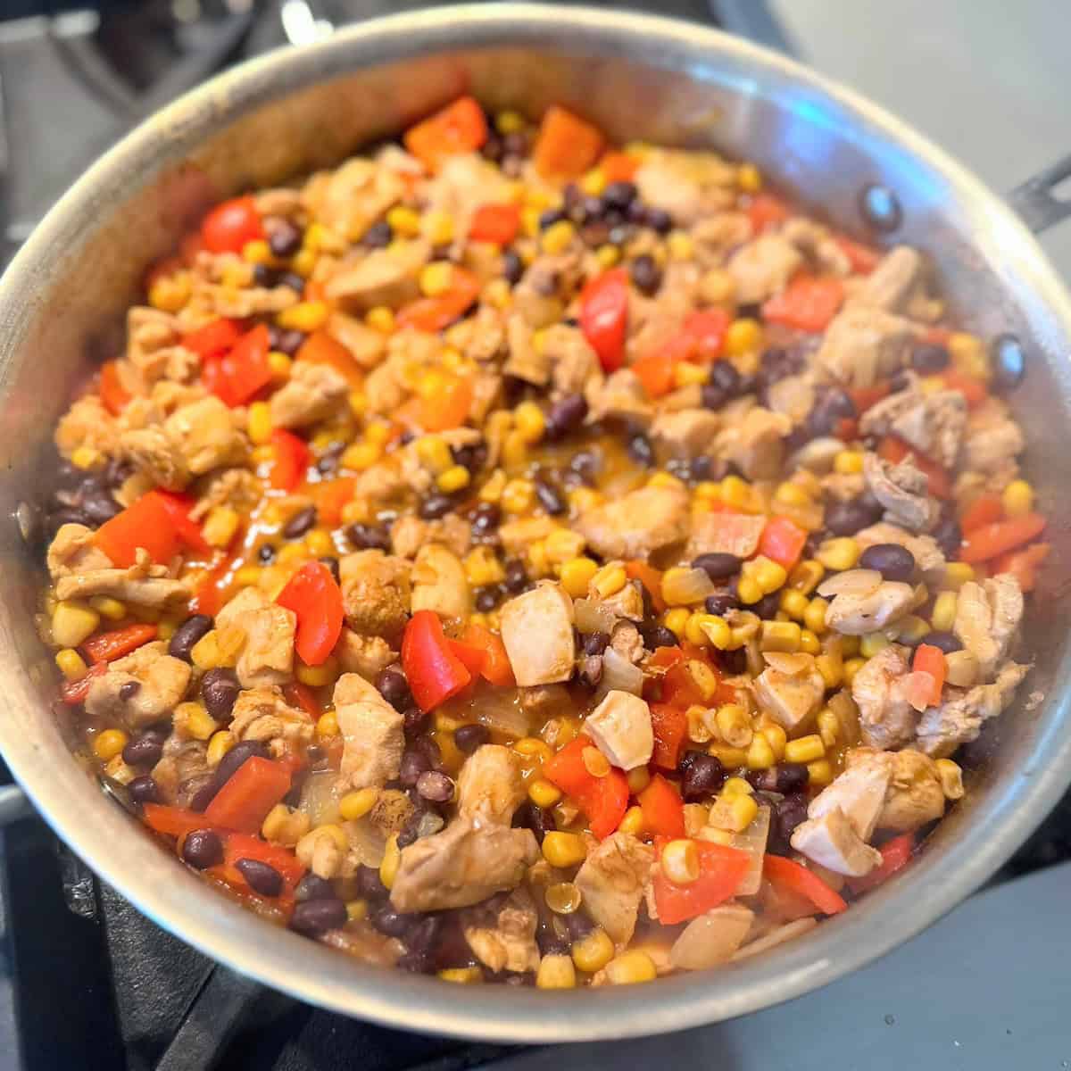 steaming pan of southwest chicken and veggies