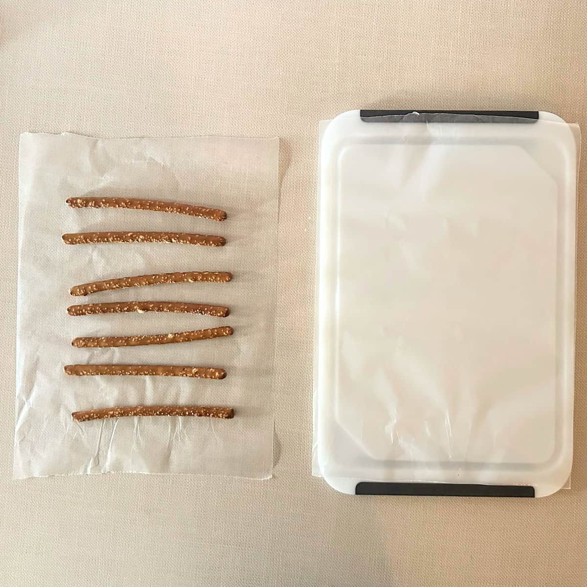 wax paper, pretzels and cutting board